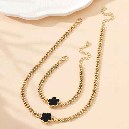 Glücksklee Schmuckset – Elegante Blumenkette & Armband