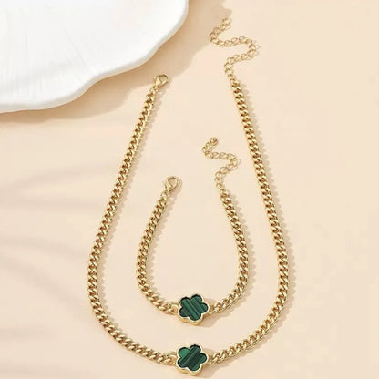 Glücksklee Schmuckset – Elegante Blumenkette & Armband